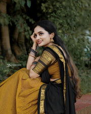 A beautifully crafted outfit with a fully stitched cotton lichi lehenga and a detachable canvas and zip fabric blouse for added convenience. Available in a range of sizes with a 5 meter flare and full lining for a comfortable fit. The georgette dupatta adds an elegant finishing touch, adorned with original Narayan Pattu work.